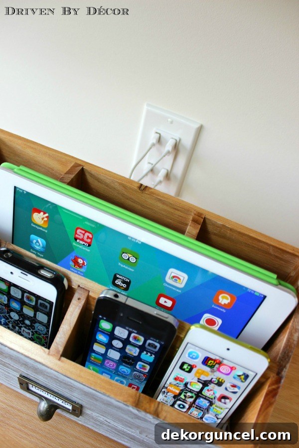 Effortless Homemade Charging Center 7 Driven by Decor - 4 port usb outlet installed behind charging station