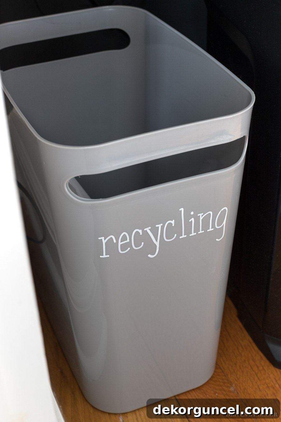 Mail Management Made Simple 8 Slim gray trash can labeled for recycling with a chalk pen, an essential part of an efficient home mail organizer.