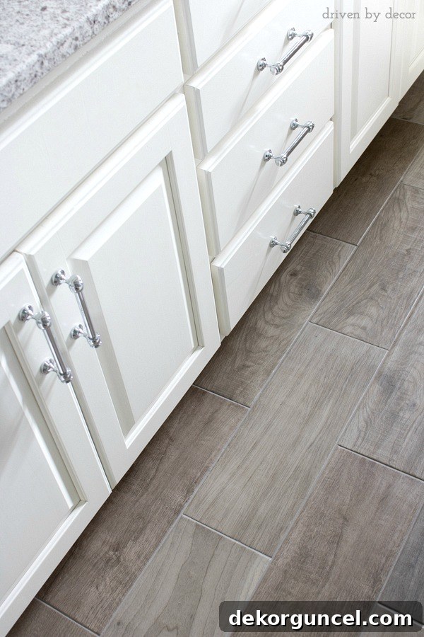 Realistic porcelain tile floor that expertly mimics the look of wood, as linked in the post.
