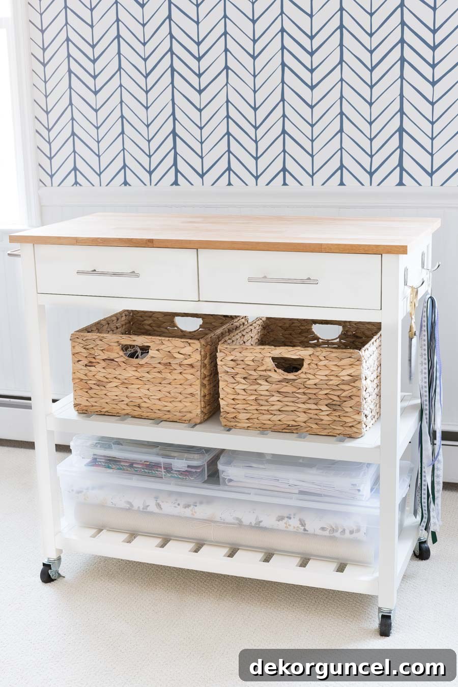 A stylish kitchen cart repurposed as a DIY gift wrapping station, featuring organized drawers and shelves for all gift-wrapping essentials.