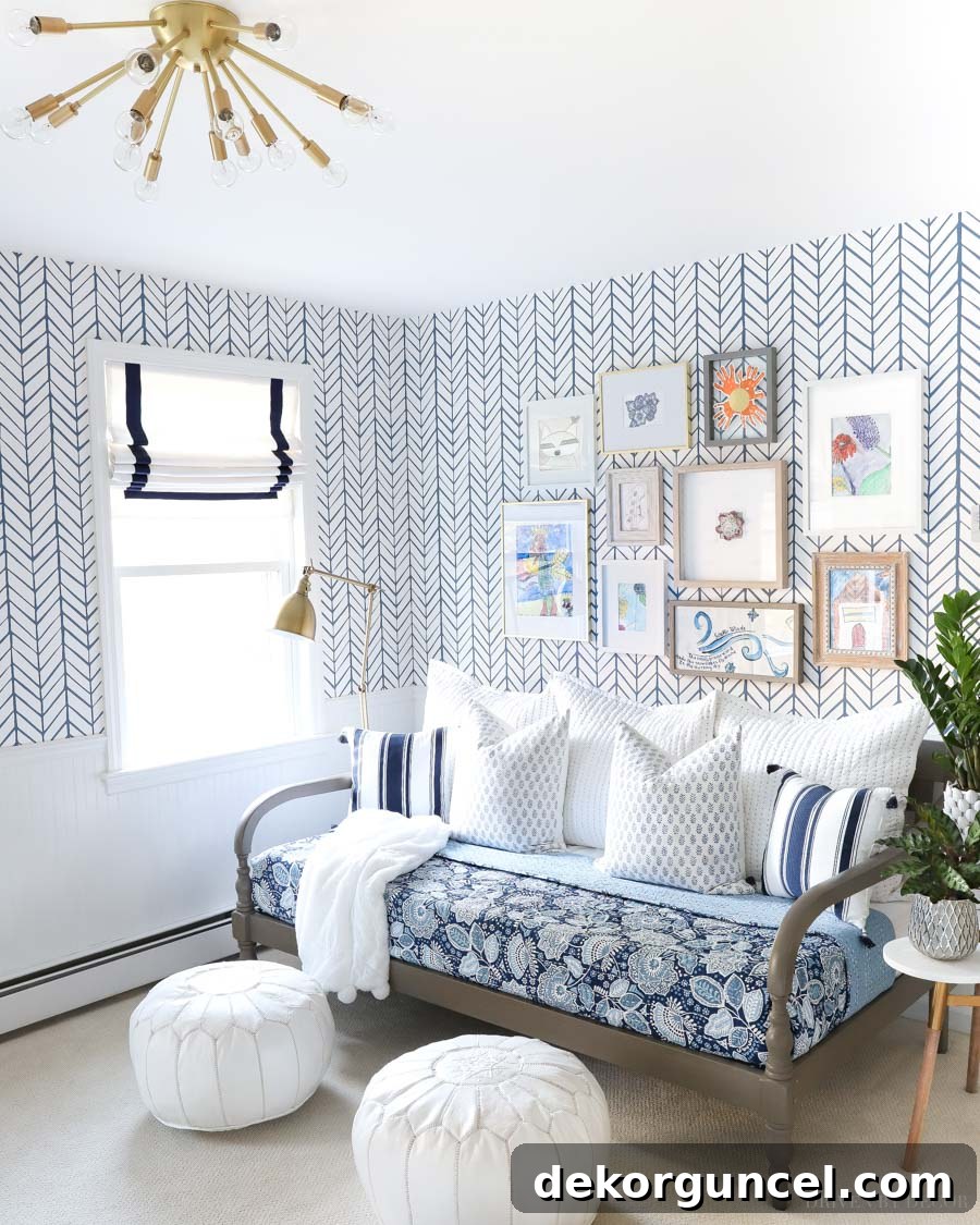 Fun blue and white Feathers wallpaper in a bonus room, creating an impactful and enchanting space for relaxation and play.