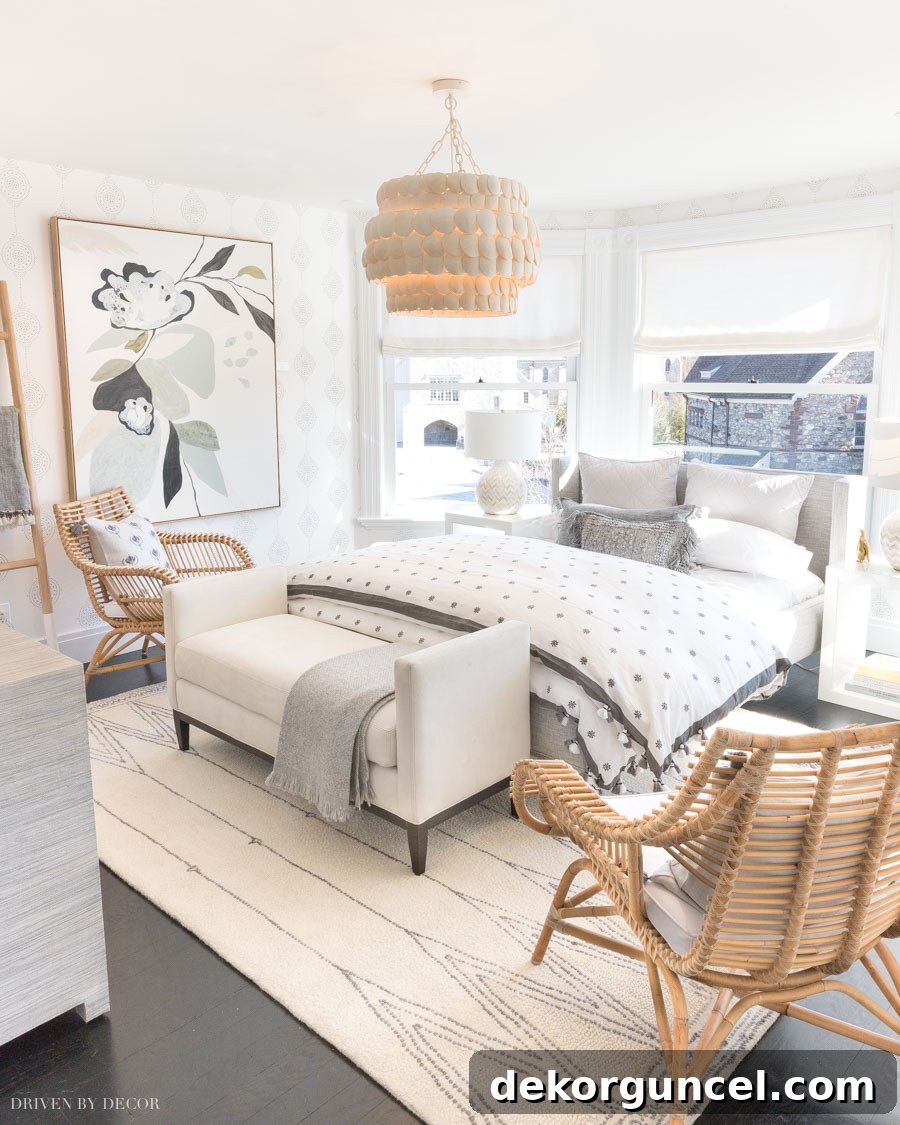 Gorgeous gray and white bedroom showcasing numerous decorating ideas, centered around the elegant Luna Stripe wallpaper for a cohesive look.