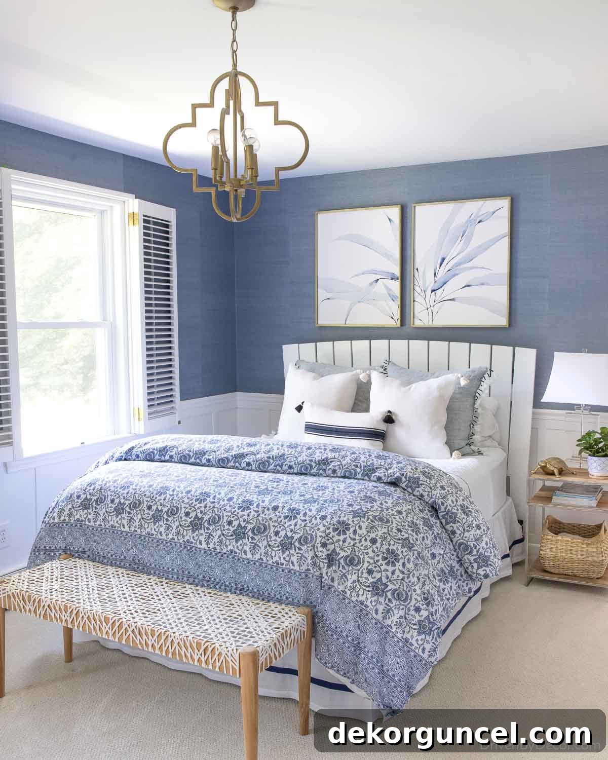 Powder blue grasscloth wallpaper installed above the chair rail in a daughter's bedroom, creating a serene and sophisticated haven.