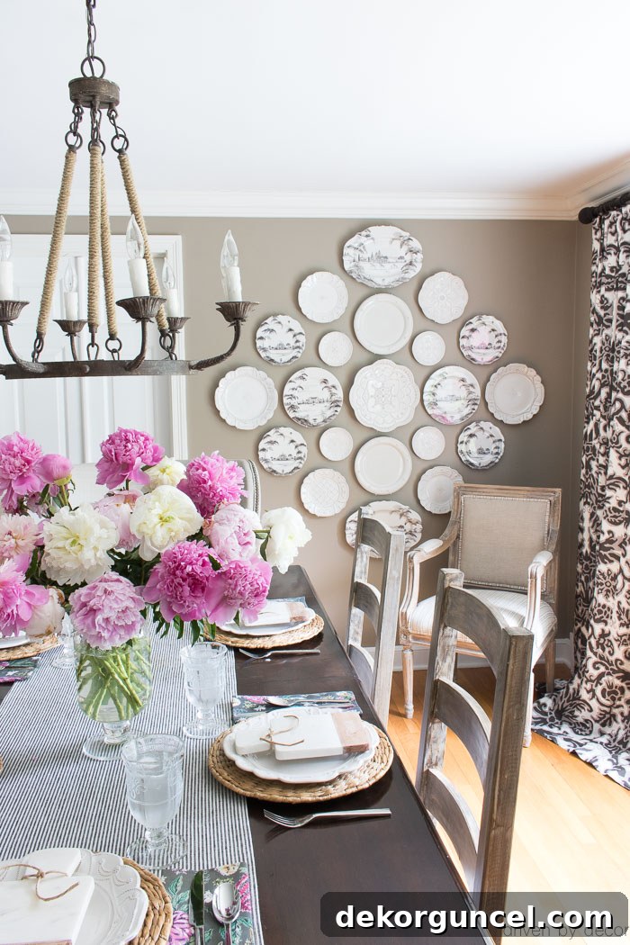 Plate Wall Decor Made Easy The Top Hangers and Methods 2 Plates hung on the dining room wall as a unique alternative to traditional art, adding charm and character.