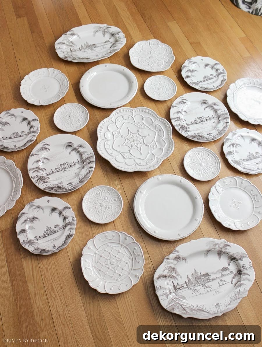 Plate Wall Decor Made Easy The Top Hangers and Methods 4 Before hanging, meticulously arrange your decorative plates on the floor to visualize the perfect wall display layout.