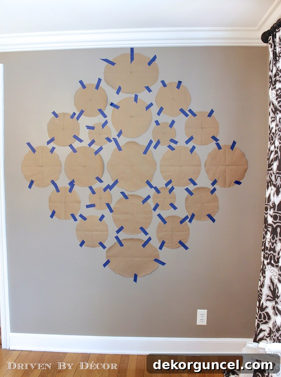 Plate Wall Decor Made Easy The Top Hangers and Methods 5 Trace each plate on paper and securely tape the templates to the wall for a perfect preview before installation.