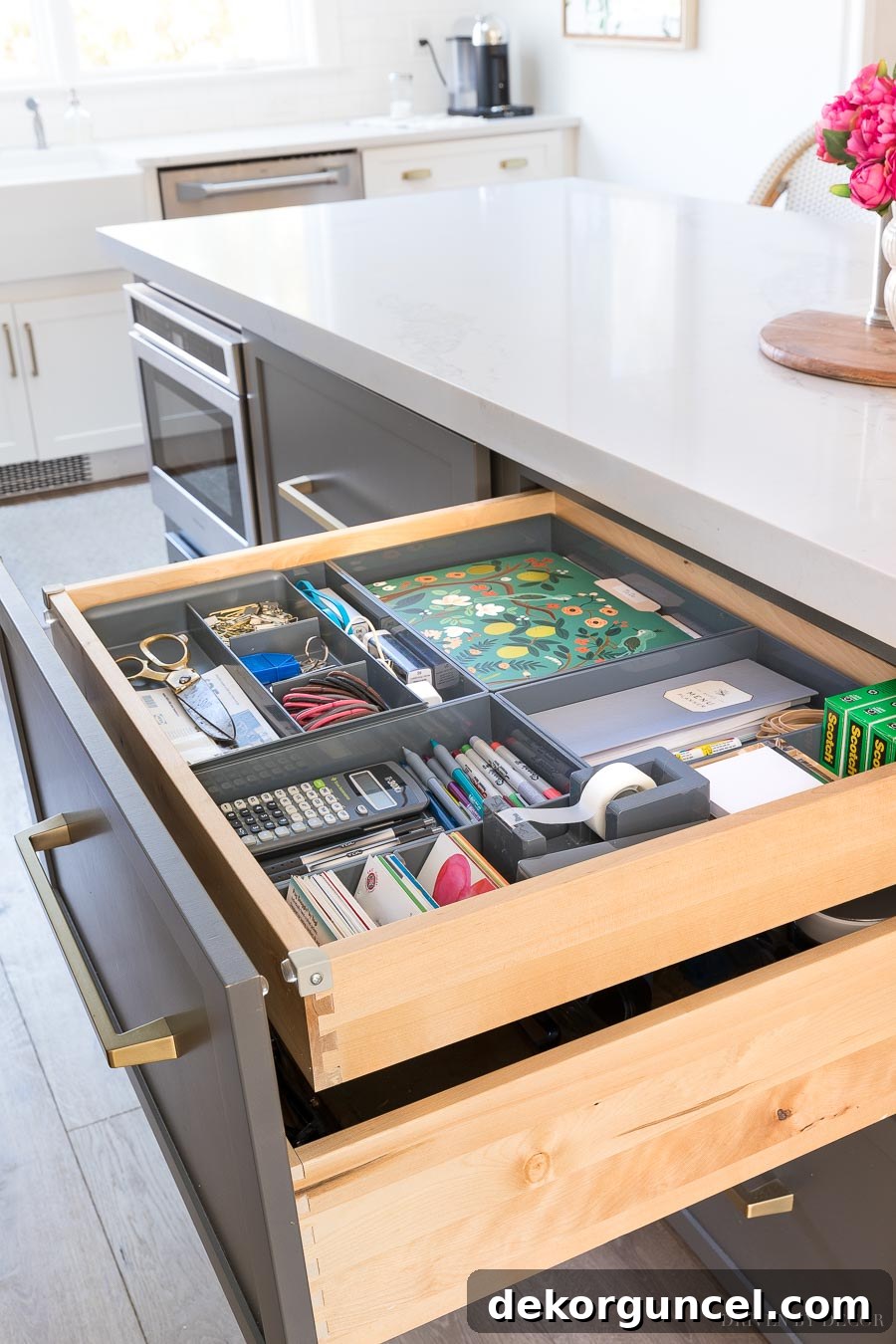 I need this! A hidden kitchen command center organized in a shallow drawer!