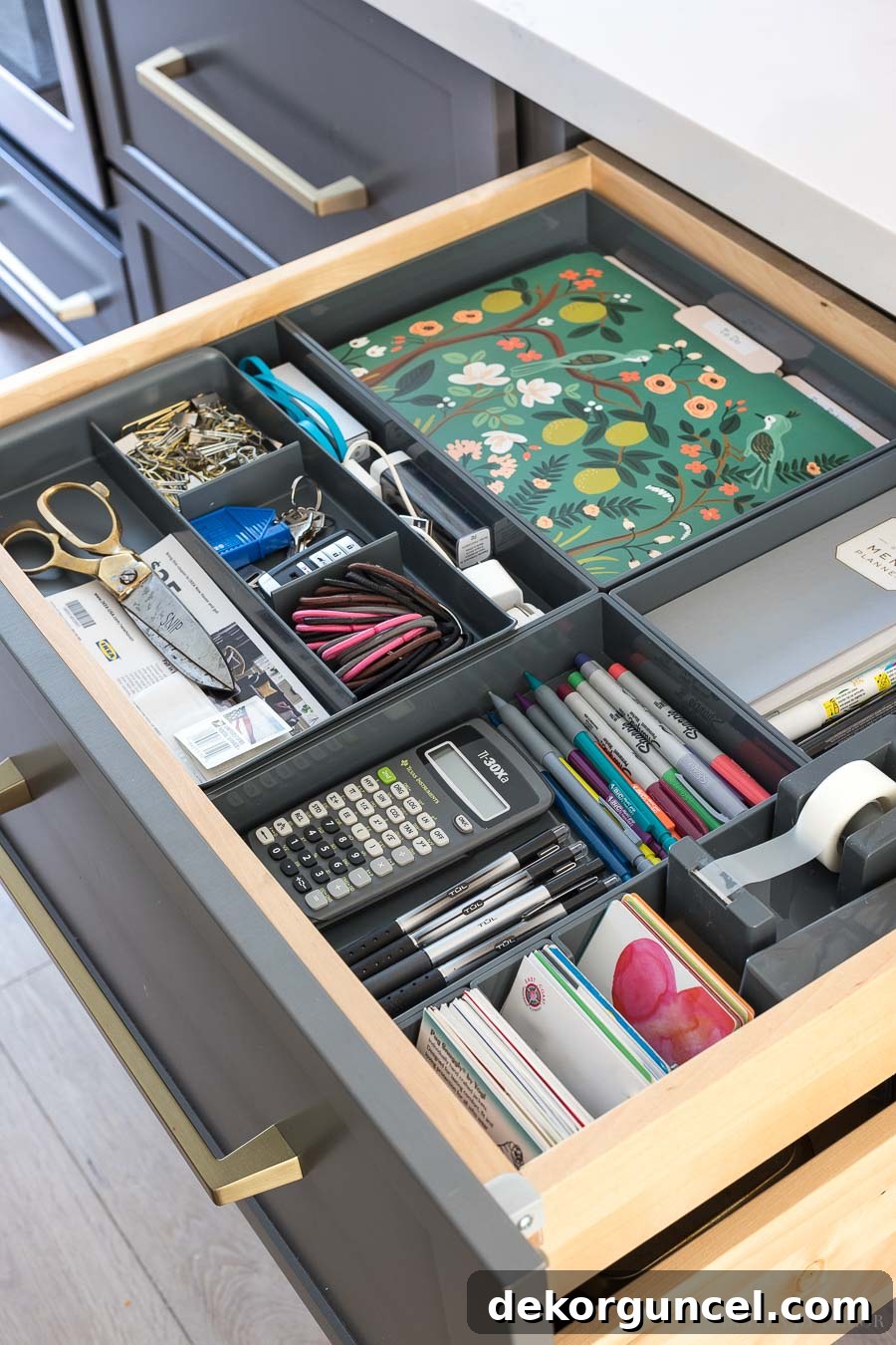 So smart! Hidden kitchen command center organized in a shallow kitchen drawer!