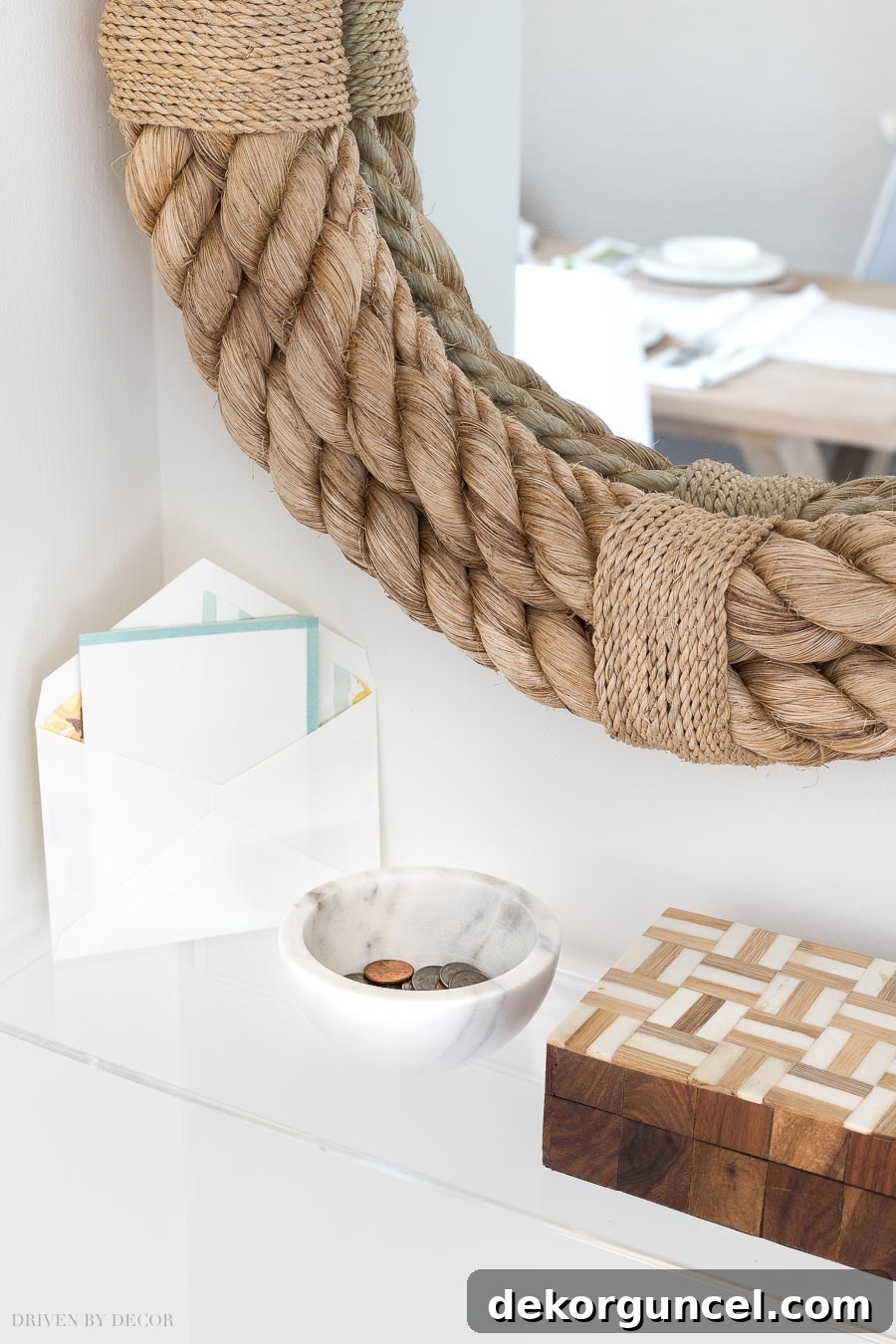 A stylish acrylic shelf serving as an organized spot for holding change, keys, and mail, making the entryway both functional and beautiful.