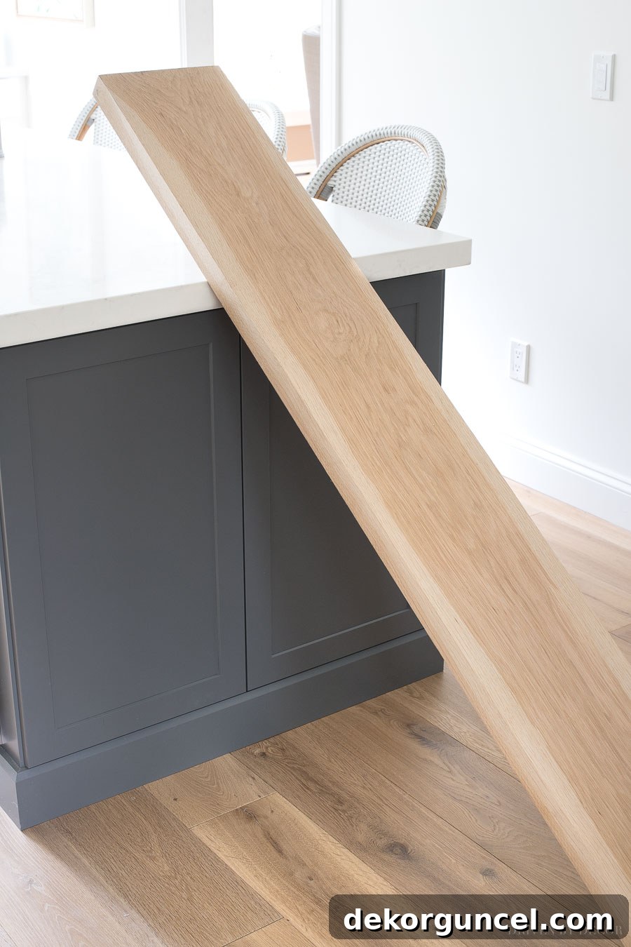 The white oak boards used to create the floating corner shelves in our kitchen. High-quality lumber for DIY shelves.