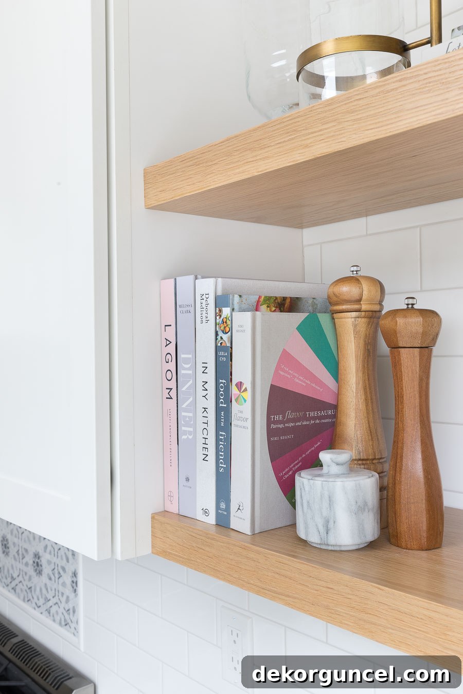 Aligning the floating corner shelves in our kitchen with the bottom of our cabinets for a seamless design. Tips for shelf bracket placement.