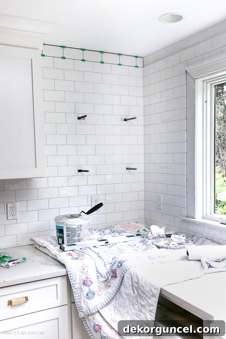 Great post on how to install brackets for floating corner shelves and seamlessly integrate them into a tiled wall.