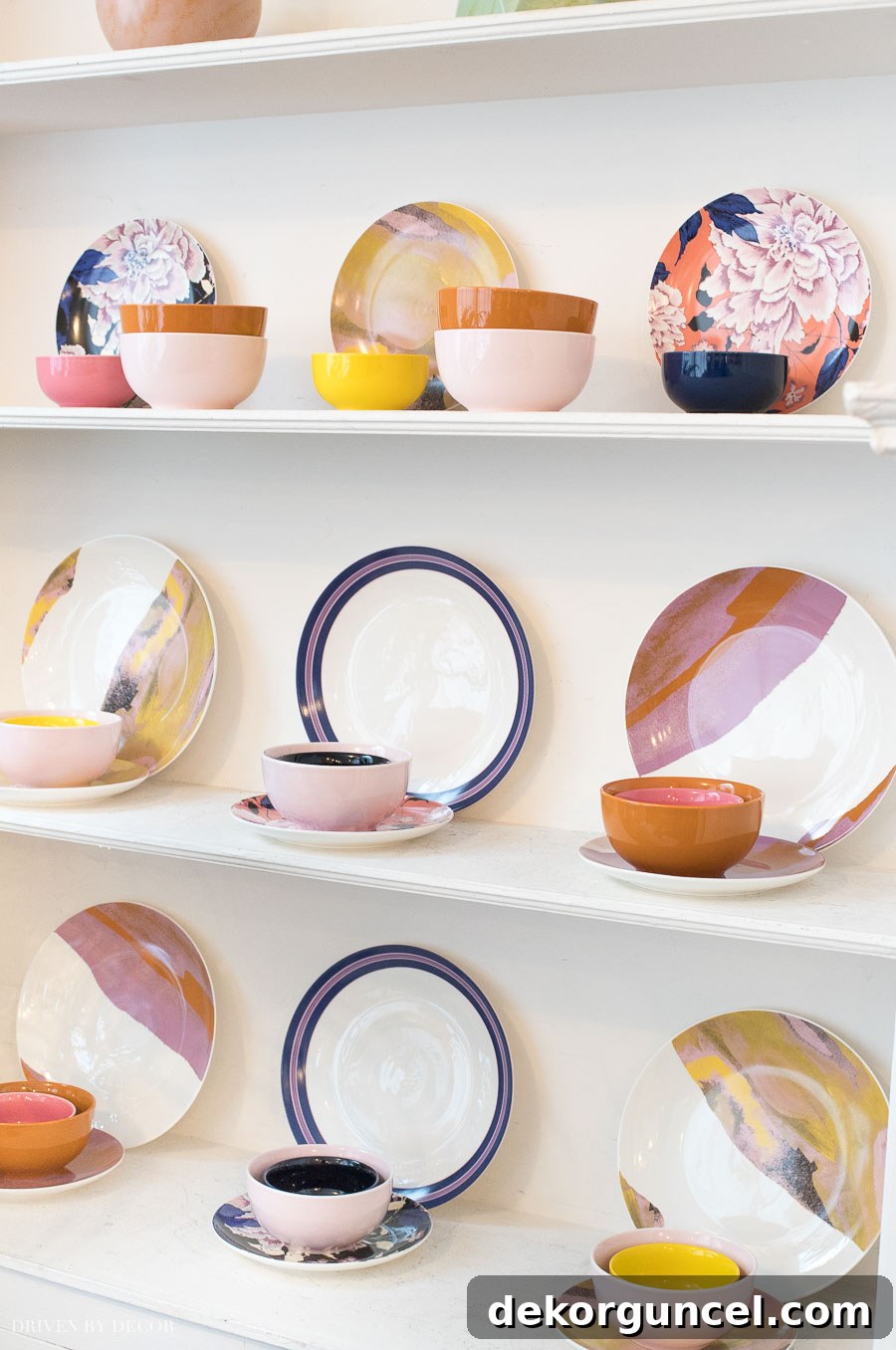 The Flower Home dinnerware by Drew Barrymore beautifully combines stripes, patterns, and solids for a unique and stylish table.