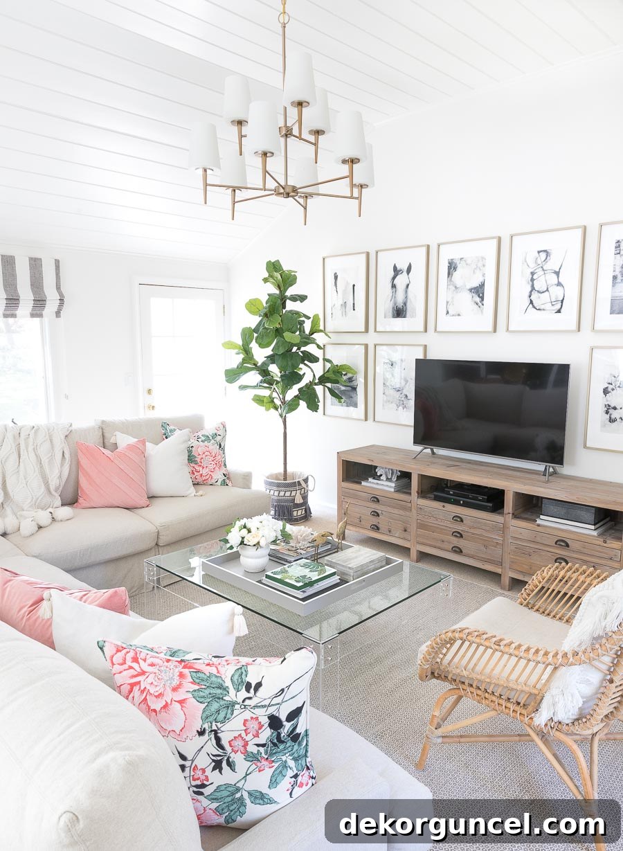Our family room transformed for spring, featuring beautiful floral pillows and a chic tasseled basket from the Drew Barrymore Flower Home collection.