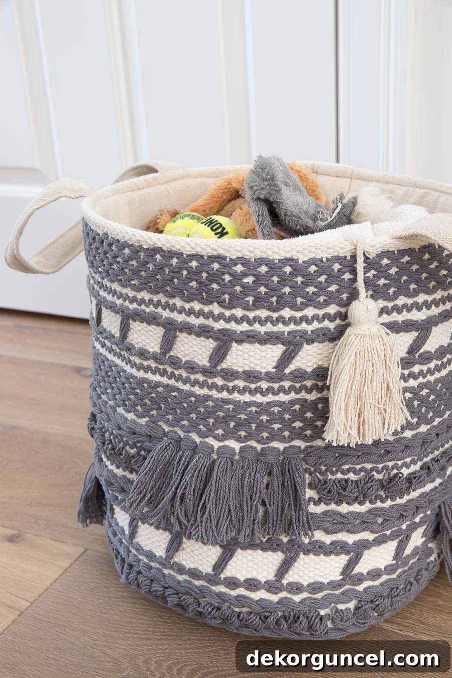 This charming macrame basket is perfectly sized for organizing kid's toys or pet essentials, keeping spaces tidy with style.