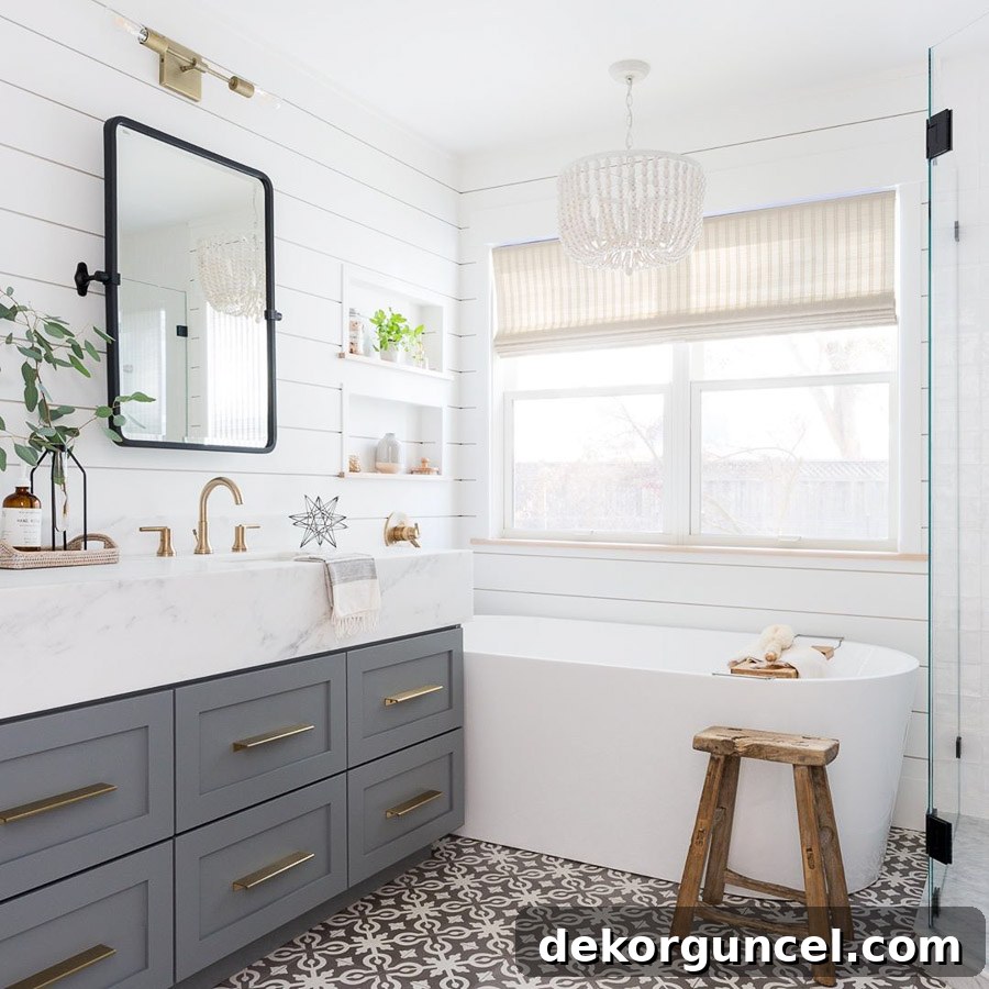 Love how they were able to add a bathtub in a smaller bathroom! Gorgeous!