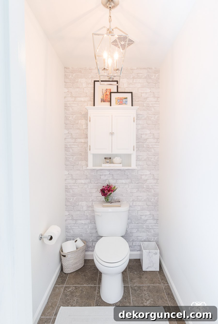 Love having a separate toilet area in master bathrooms like this beauty from the home of Kelley Nan