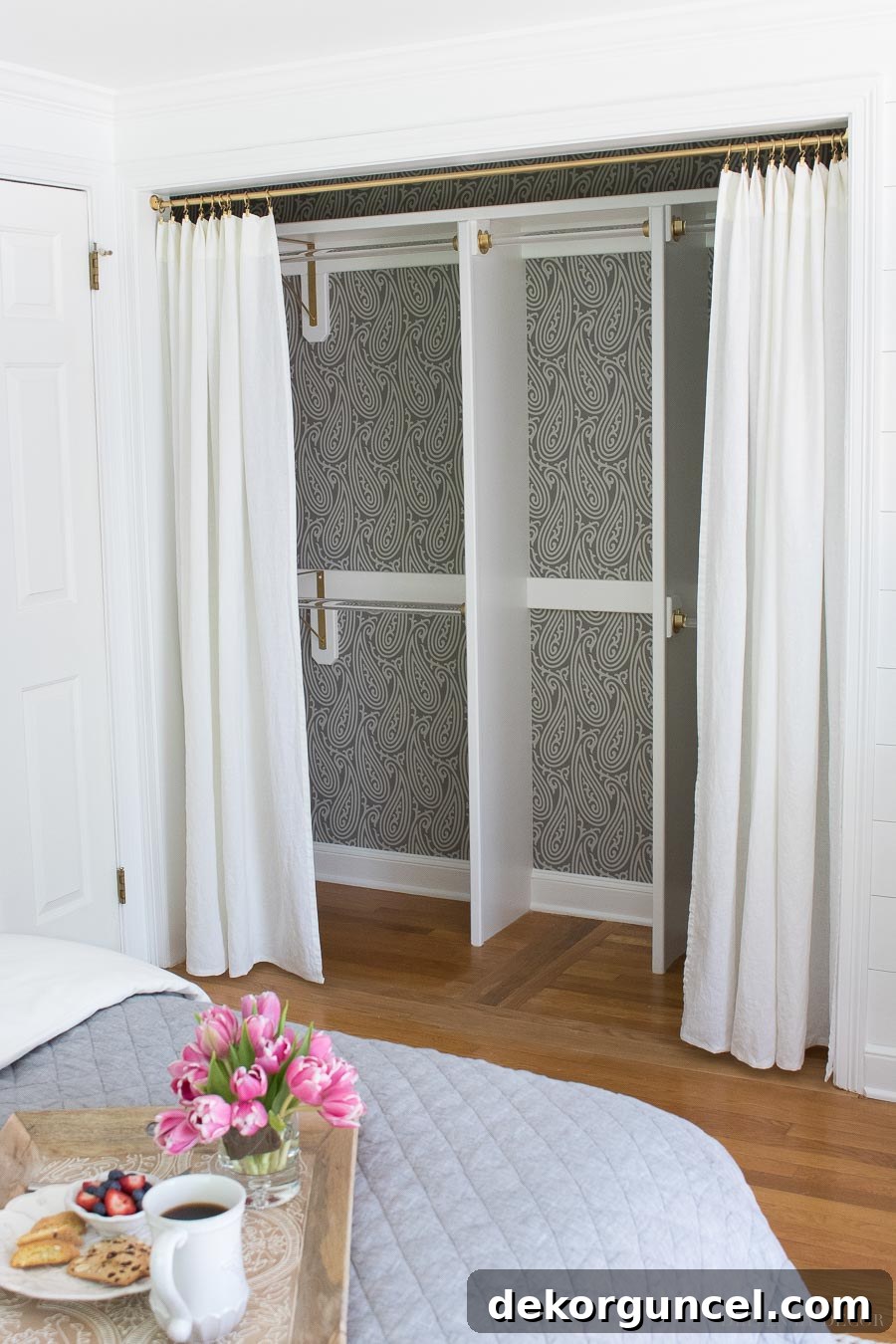 One of my favorite closet door ideas in this post! Removing the bifold doors and replacing them with drapes!