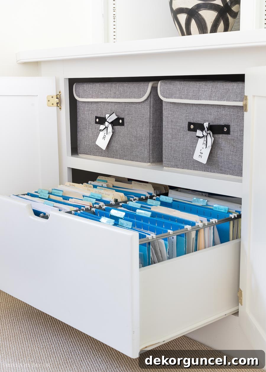 A clever hidden cabinet drawer with integrated hanging file folders, showcasing smart home organization solutions.