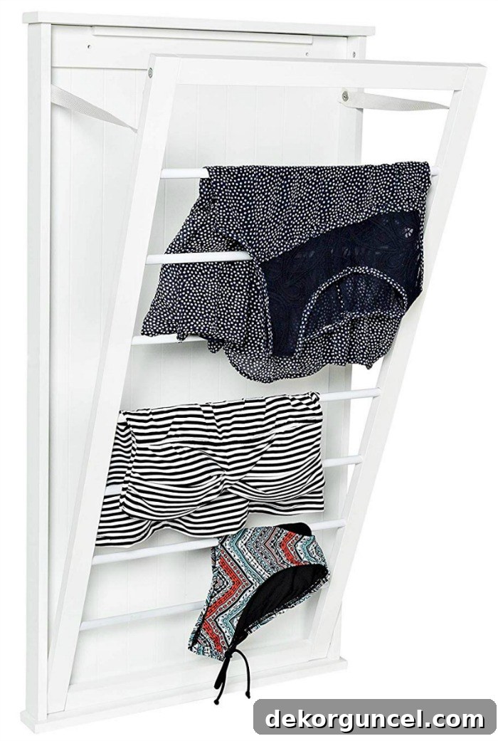 Laundry Room Storage Ideas to Maximize Your Space 12 A beautifully designed wall-mounted drying rack, ideal for any laundry room to efficiently air dry clothes.