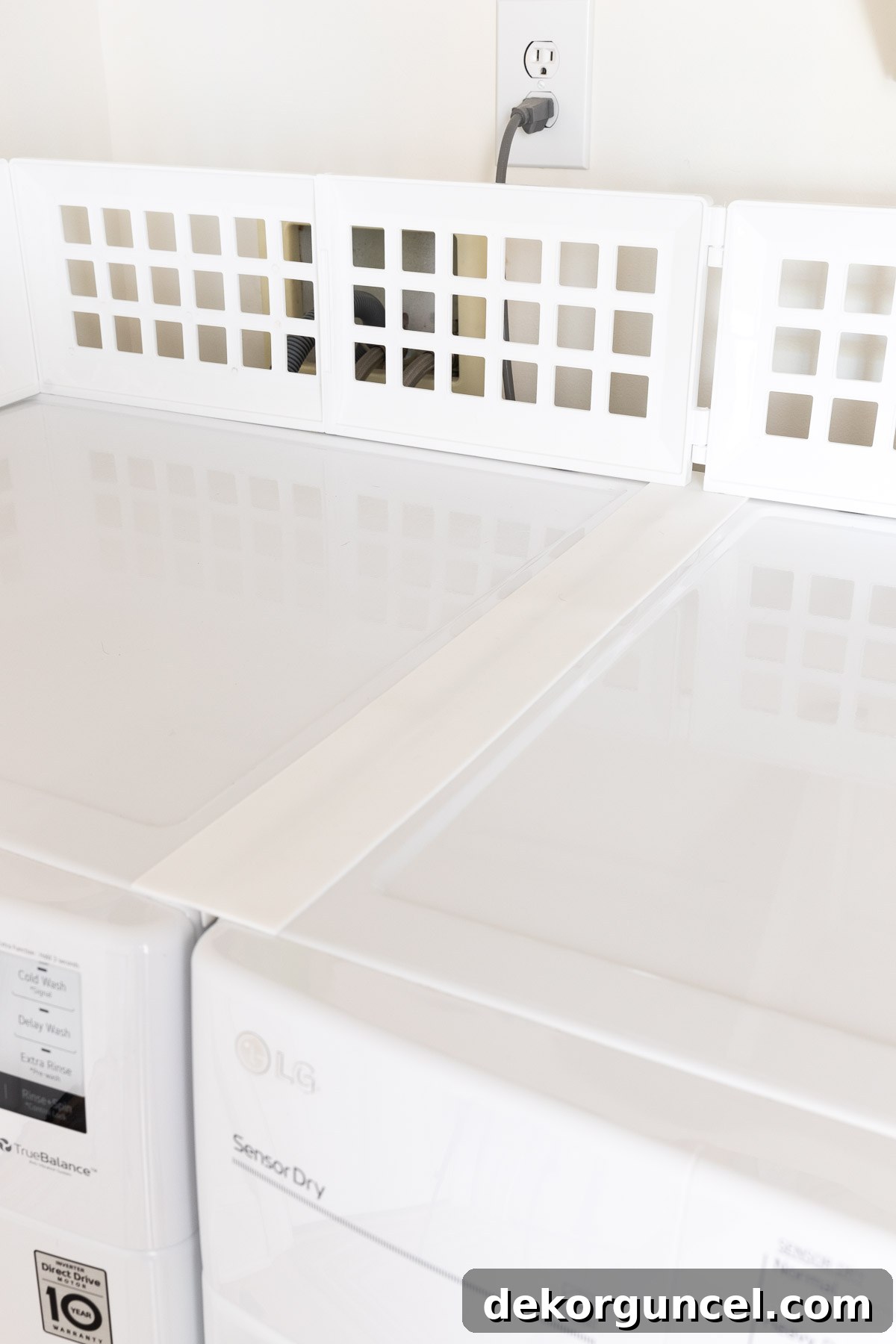 Laundry Room Storage Ideas to Maximize Your Space 17 A silicone strip effectively covering the crack between a washer and dryer, preventing items from falling through.