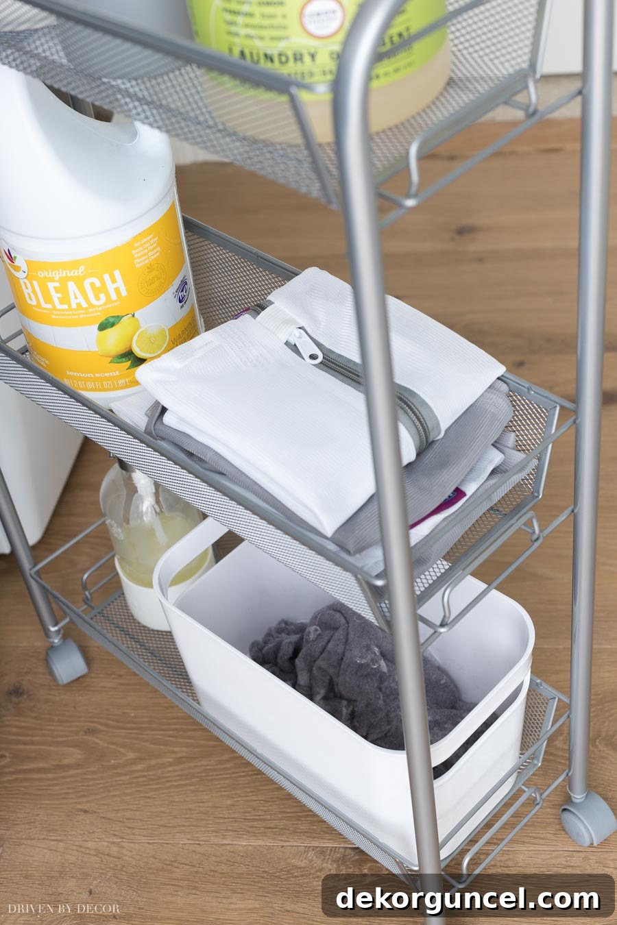 Laundry Room Storage Ideas to Maximize Your Space 4 A rolling cart filled with laundry essentials like detergent, delicate wash bags, and a handy bin for lint, making laundry tasks much easier.