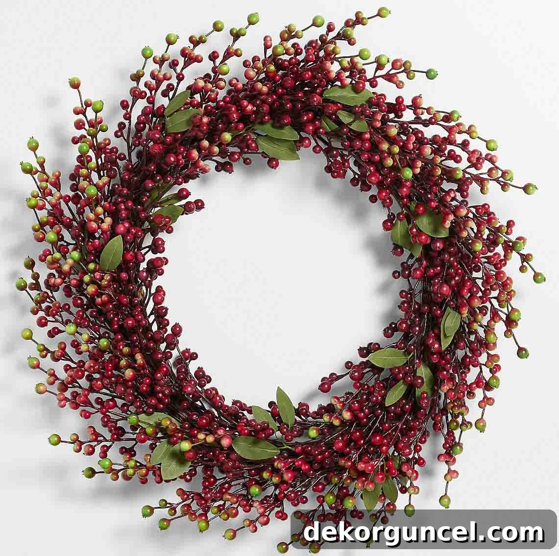 A luxurious 28-inch red berry wreath, perfect for adding a touch of elegance to fall decor and seamlessly transitioning into the holiday season.