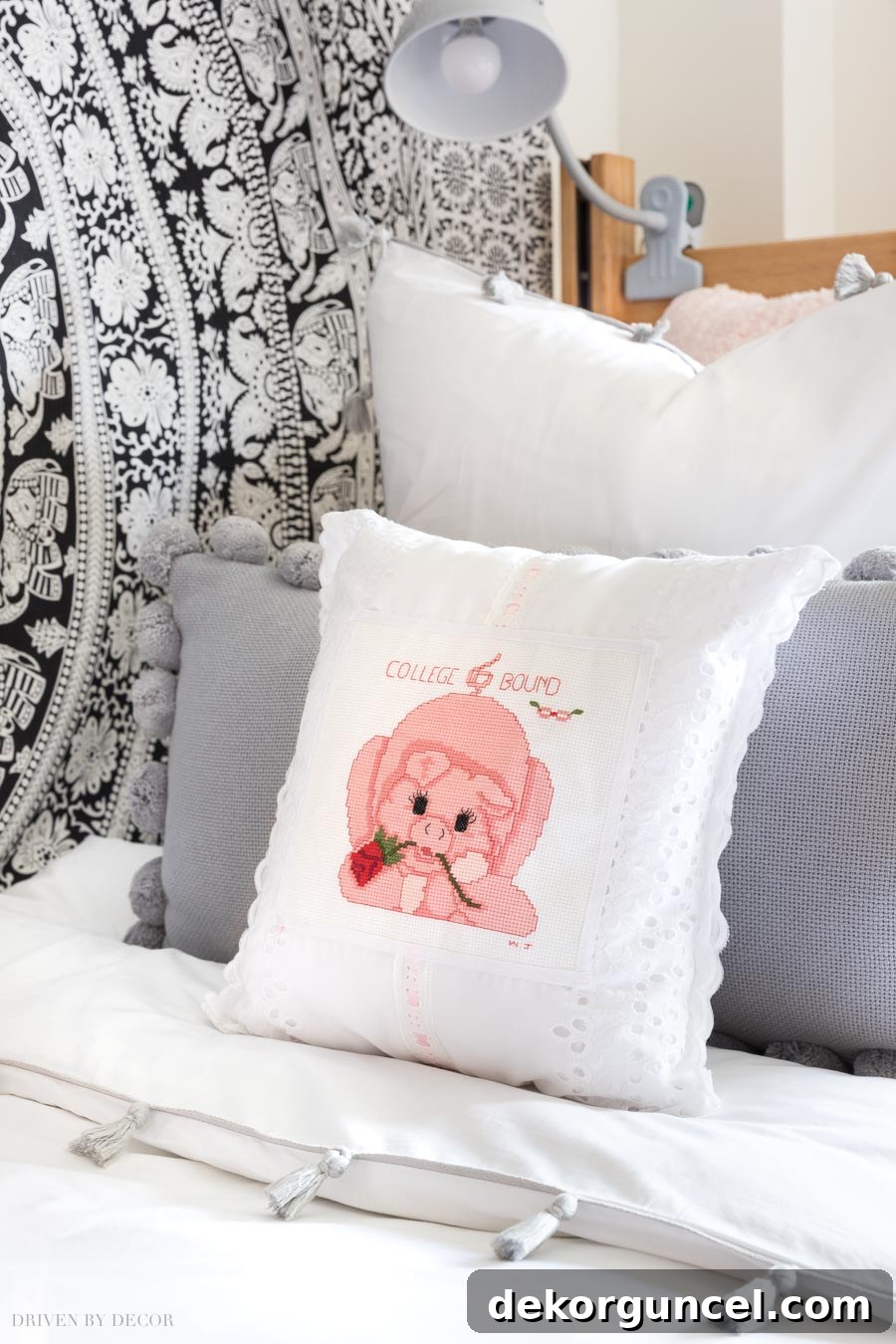 Heartwarming 'College bound' cross-stitched pillow, a cherished dorm room detail!