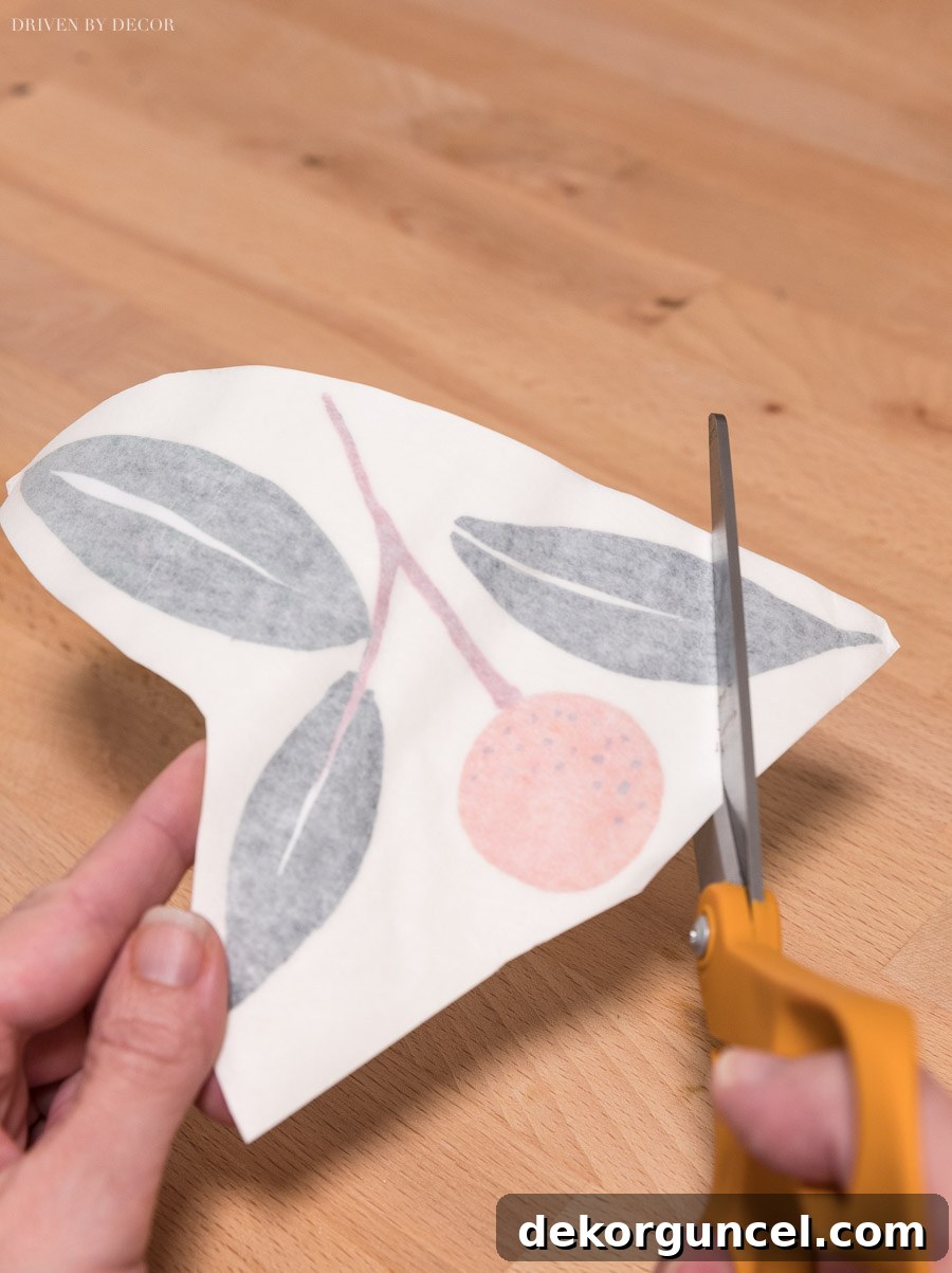 A neatly trimmed vinyl wall decal edge, showcasing the finished look after cutting excess material for a custom fit against a wall or molding.