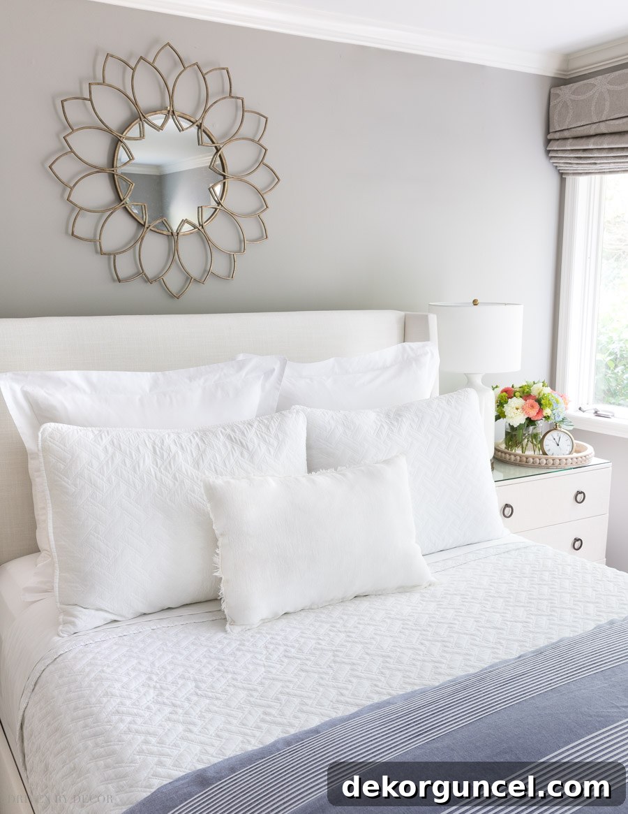 Love this all white look! This post has tons of ideas for arranging your bed pillows in different ways!