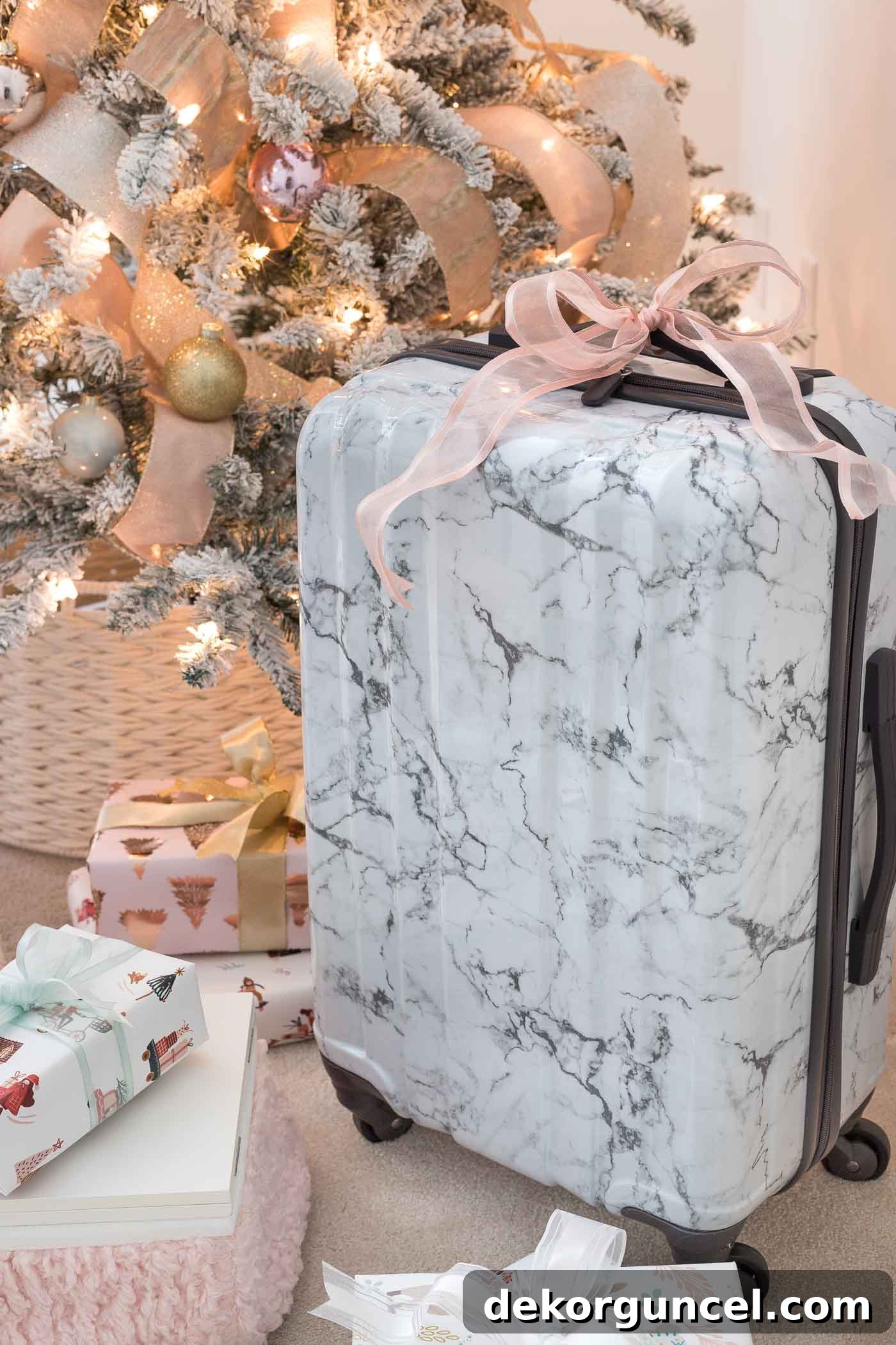 A beautiful marble carry-on suitcase, an excellent and practical Christmas gift idea for teen girls who love to travel.