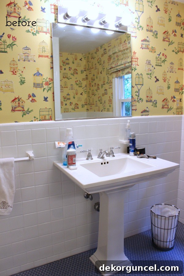 Affordable Bathroom Renovation Ideas 2 Old dated hall bathroom before budget remodel, showing wallpaper, basic mirror, and carpet