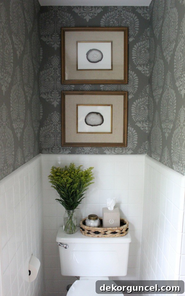 Affordable Bathroom Renovation Ideas 13 DIY art created with Target frames and agate slices, stacked above the toilet