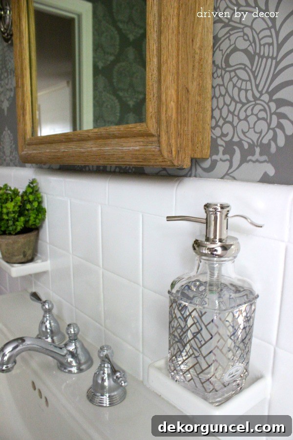 Affordable Bathroom Renovation Ideas 7 HomeGoods soap pump perfectly fitted into a built-in soap dish, demonstrating clever repurposing