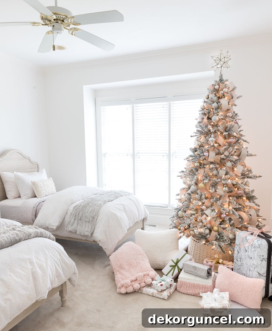 A sweet and inviting girls' room decorated for Christmas, featuring two twin beds and charming festive touches.