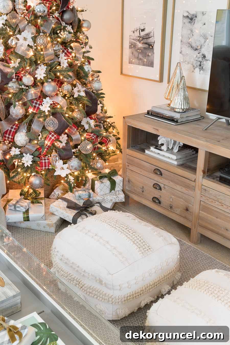 Our inviting family room featuring stylish and functional floor poufs, perfect as footrests or extra seating during the holiday season.