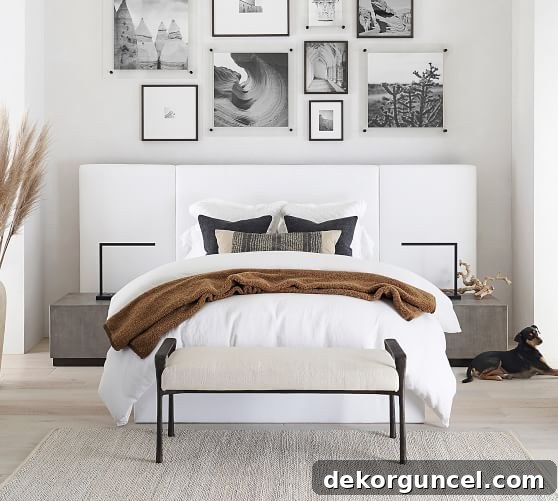 6 Home Decor Trends Shaping 2020 11 Pottery Barn's Sorrento Upholstered Bed exemplifies the 2020 trend for wide upholstered panel beds, creating a dramatic and luxurious bedroom focal point.