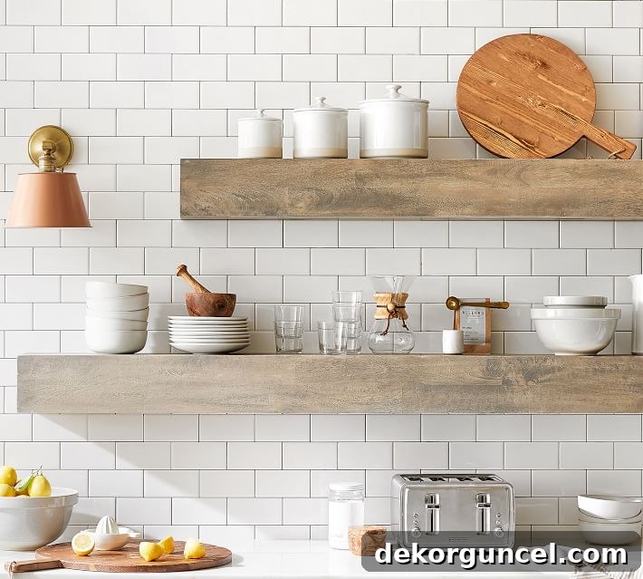 6 Home Decor Trends Shaping 2020 15 Gorgeous open shelving made with mango wood, a trending and sustainable material in 2020 home decor, combines style with eco-conscious design.
