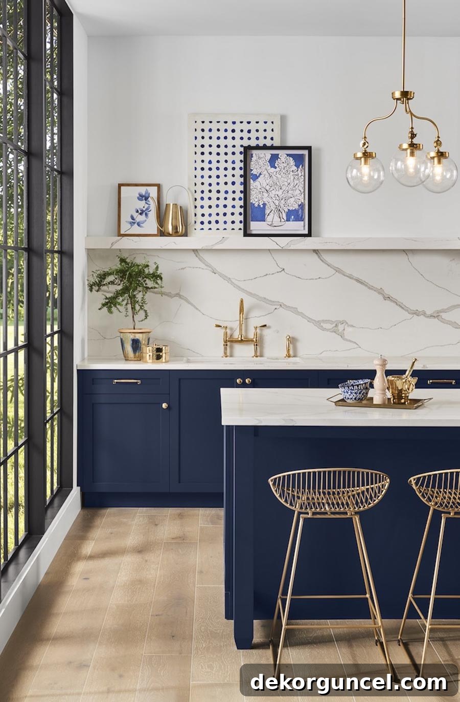 6 Home Decor Trends Shaping 2020 16 This stunning kitchen showcases deep blue cabinets, an undeniable trending color for 2020 kitchens, adding sophistication and depth.