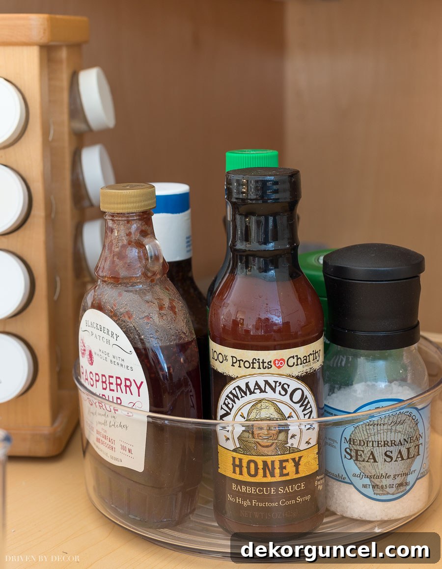 Lazy Susan turntable making spices and condiments easily accessible in a well-organized pantry