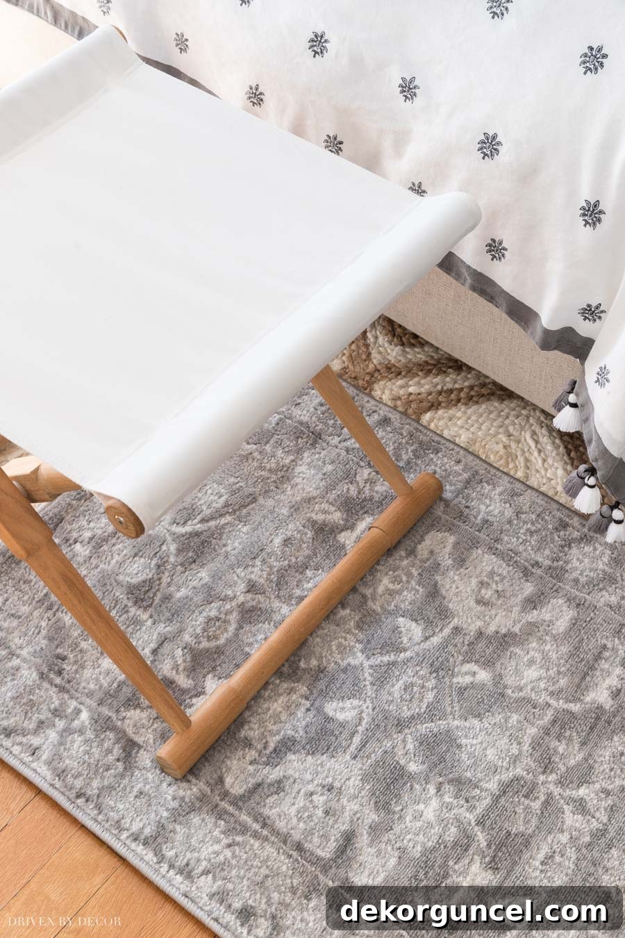 A gorgeous patterned gray synthetic rug, known for its softness and high cleanability.