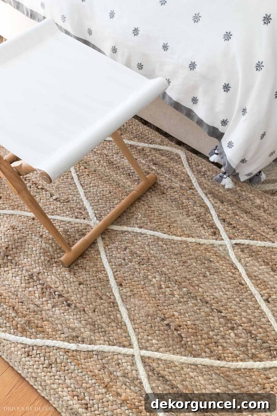 A beautiful braided diamond pattern jute rug, perfect for adding warmth and texture to bedrooms or living rooms.