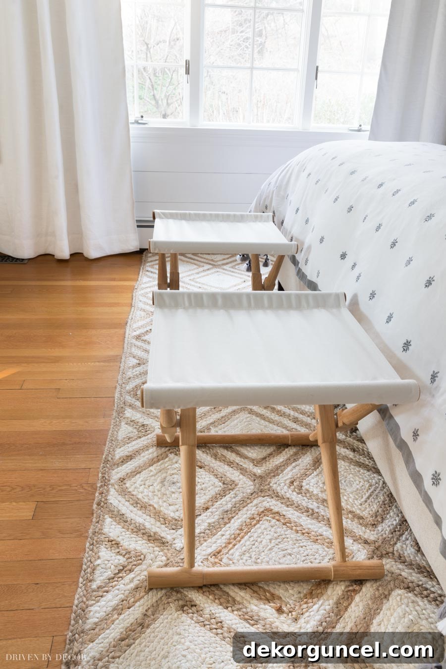Tips on choosing the right size jute rug, illustrating space for benches at the foot of the bed.