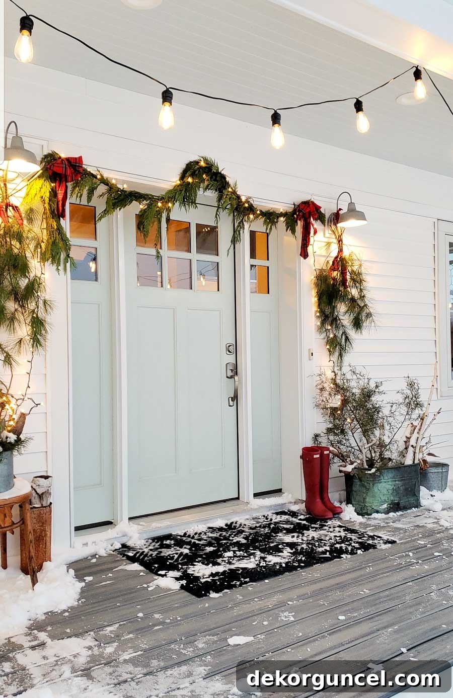 A stunning front door painted in Benjamin Moore Palladian Blue, a popular and inviting blue-green shade.