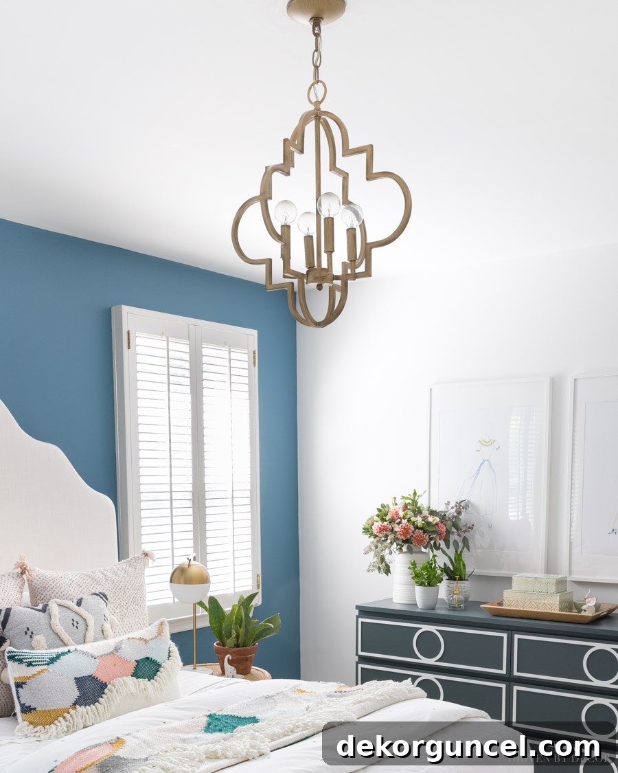 Gorgeous quatrefoil design pendant light - love it in this bedroom!