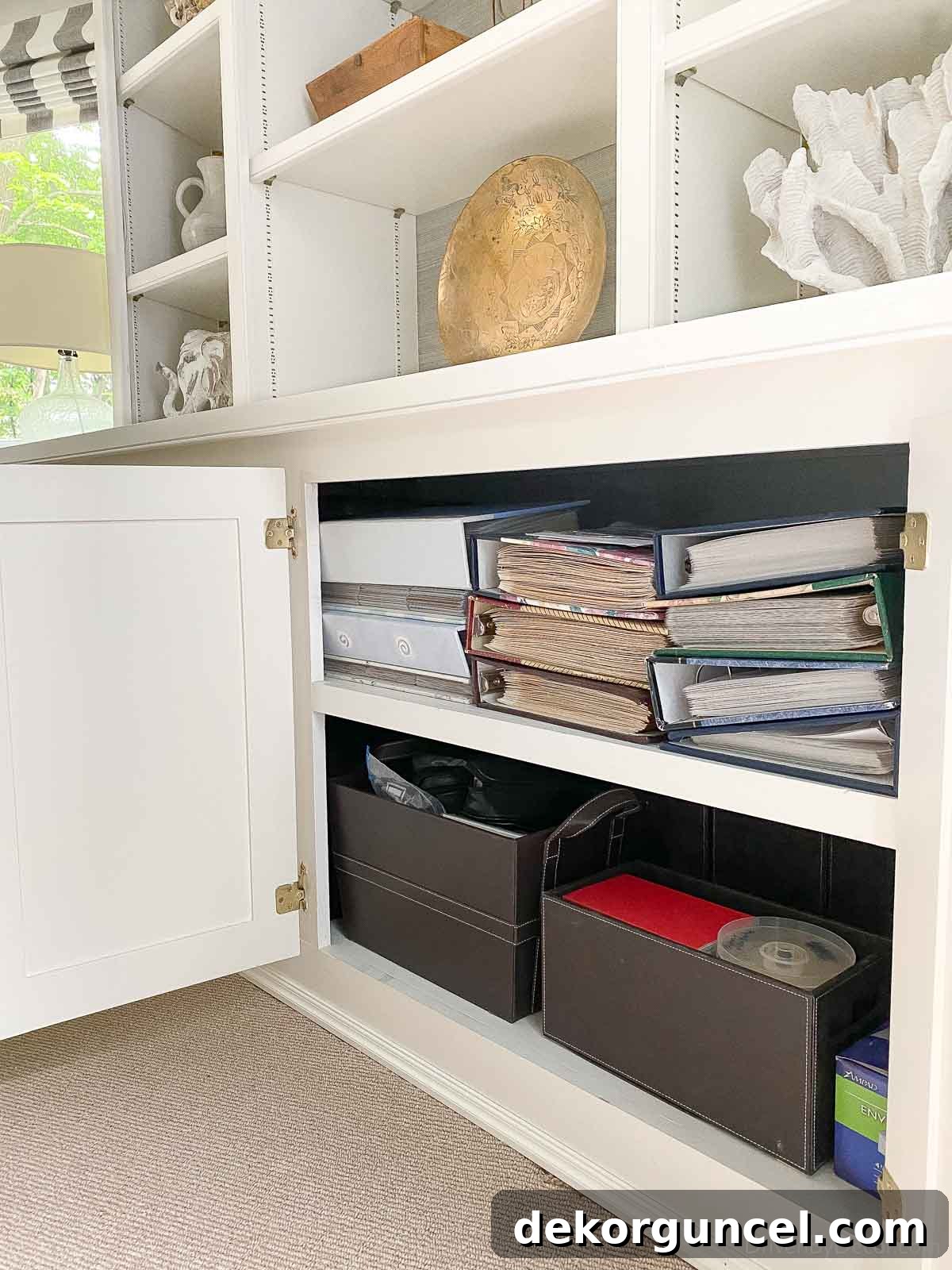 20 Genius Home Organization Hacks for a Clutter-Free Home 12 Stacks of old photo albums waiting for digital organization