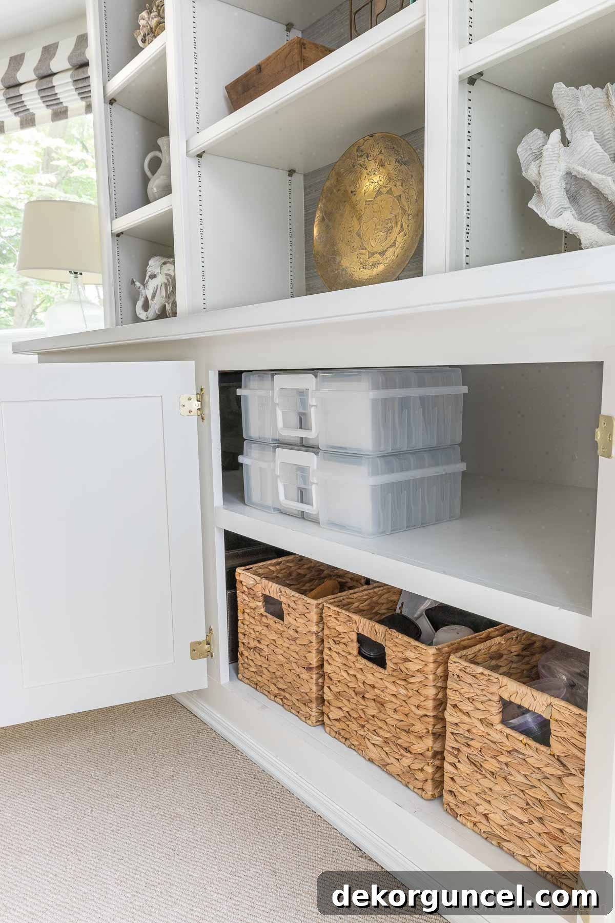 20 Genius Home Organization Hacks for a Clutter-Free Home 16 Cabinet with photo cases showing significant newly freed-up space