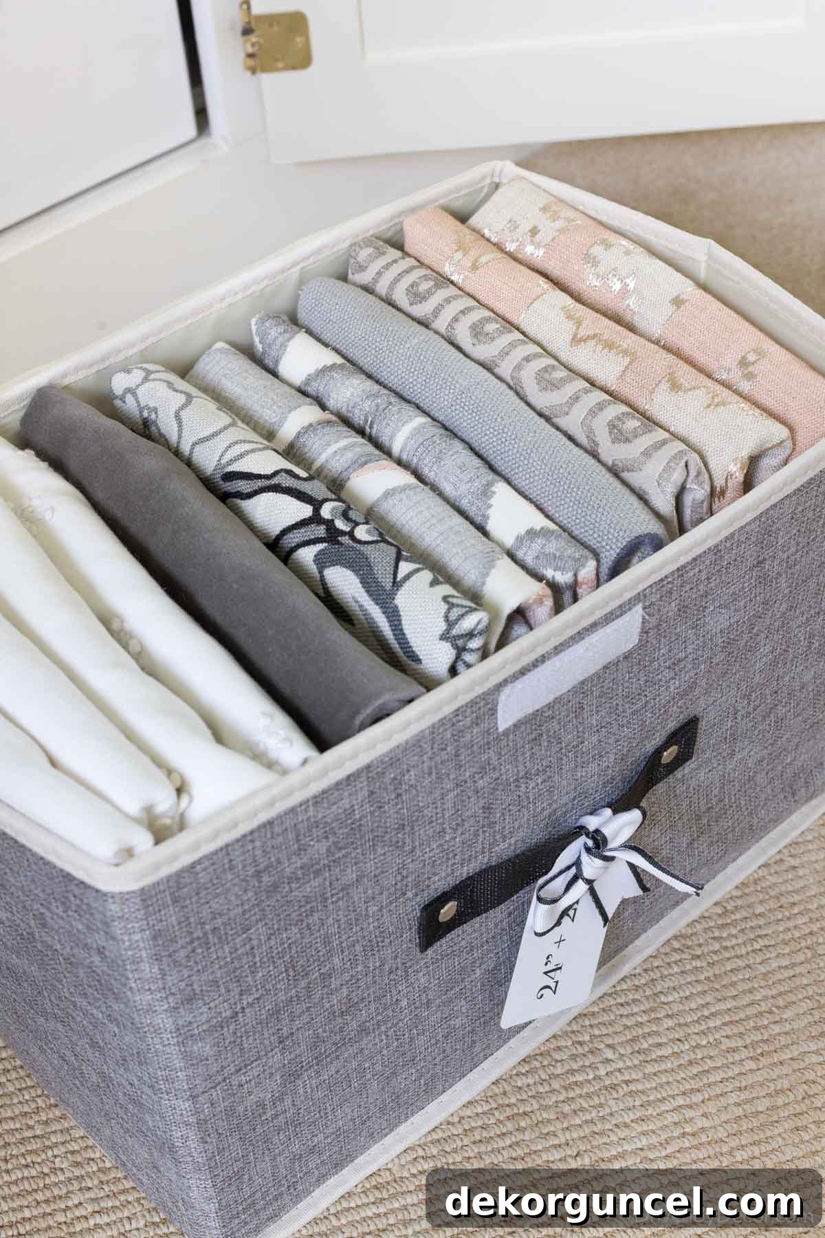 20 Genius Home Organization Hacks for a Clutter-Free Home 20 Pillow covers neatly folded and stored in a fabric storage box