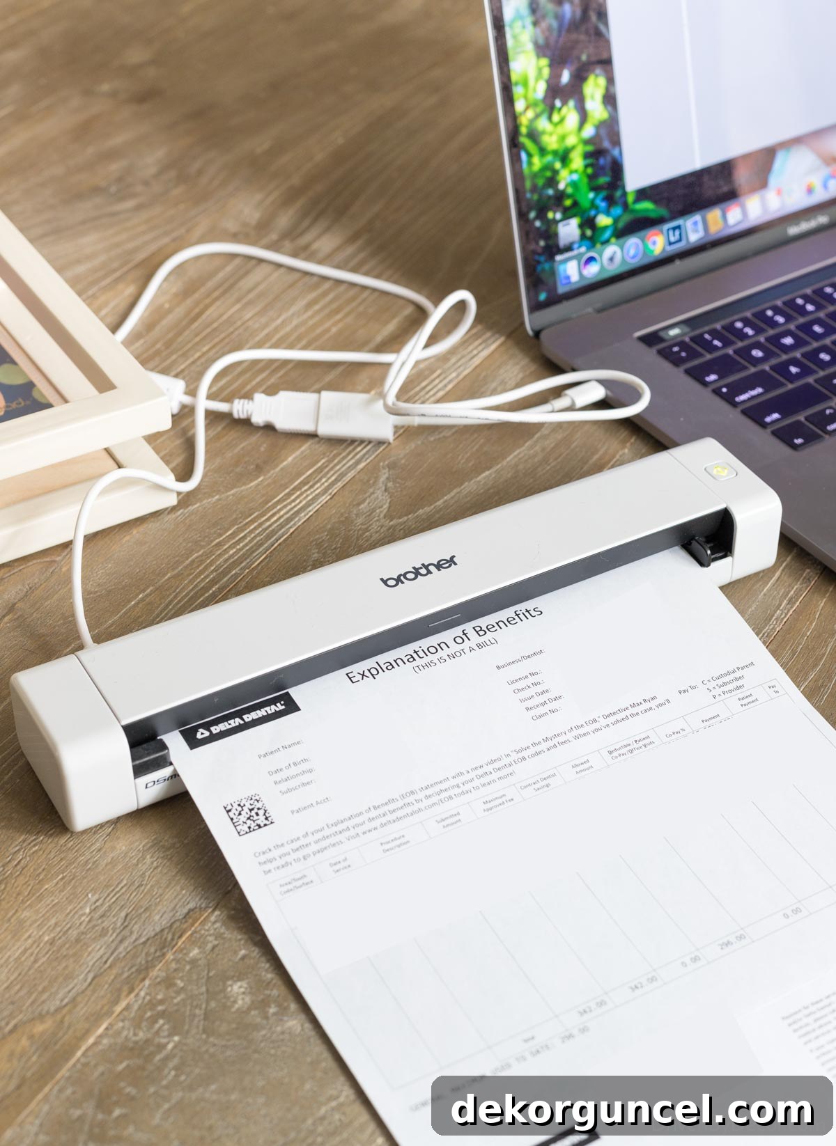 20 Genius Home Organization Hacks for a Clutter-Free Home 31 Mobile scanner actively digitizing a document