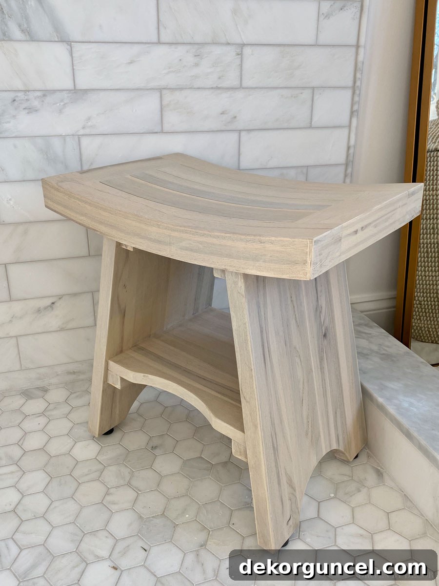 Effortless Bathroom Style for an Instant Update 21 Perfect teak shower bench for showers without built-in seating, showcasing elegant bathroom decor